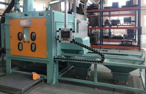 Sand blasting machine